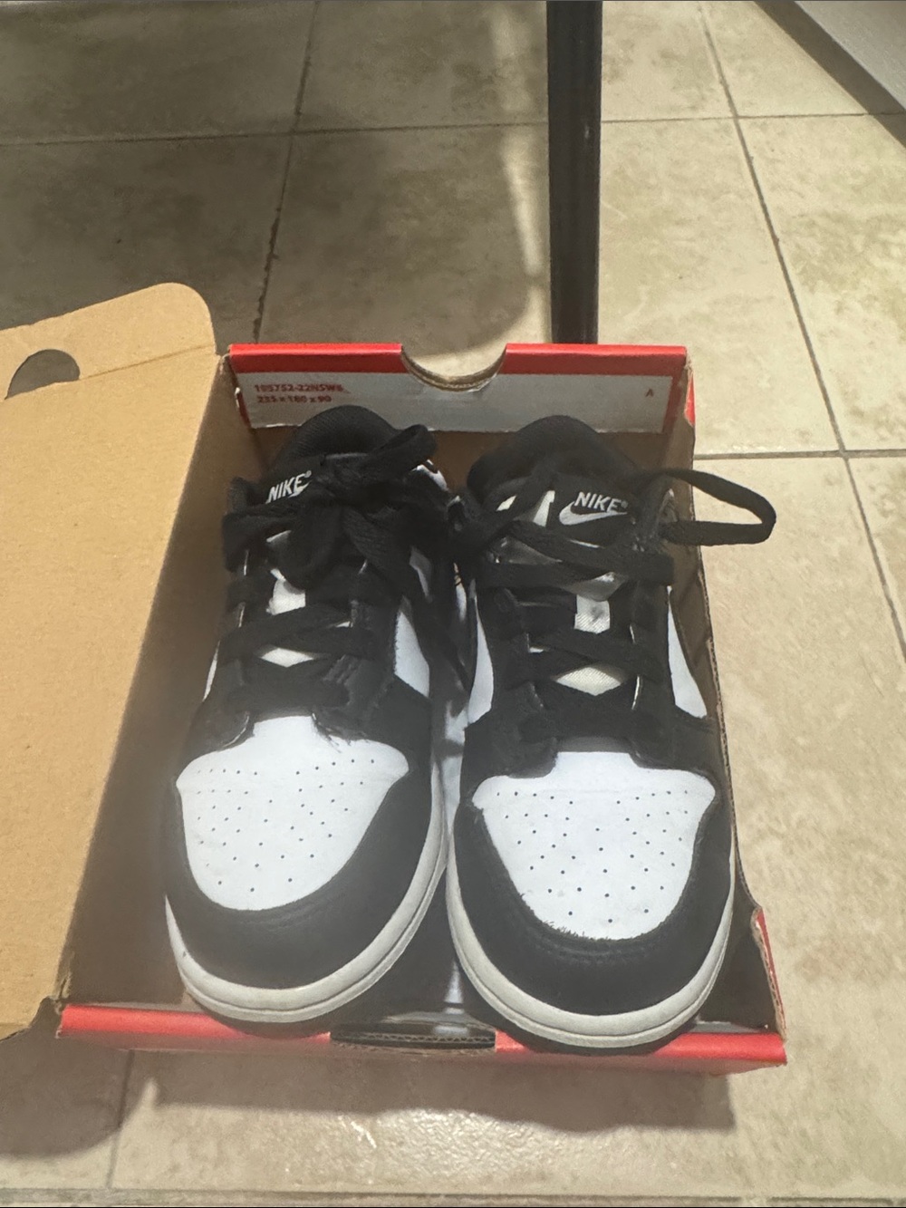 Nike Black and White Low-Top Sneakers with Classic Two-Tone Design